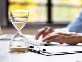 Late Invoice And Billing Deadline With Hourglass