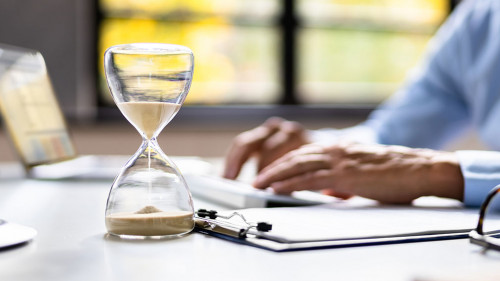 Late Invoice And Billing Deadline With Hourglass