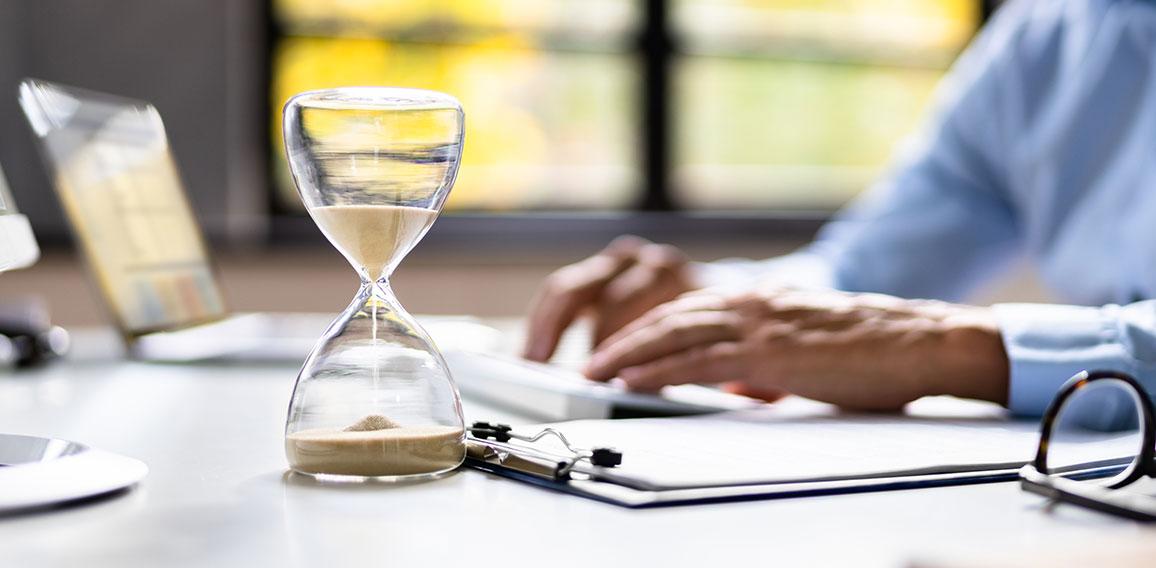 Late Invoice And Billing Deadline With Hourglass