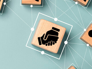 Top view design on blue background of Hand shaking which print s