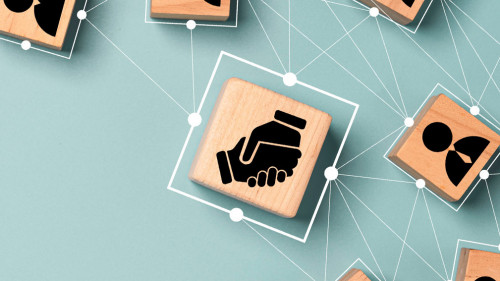 Top view design on blue background of Hand shaking which print s