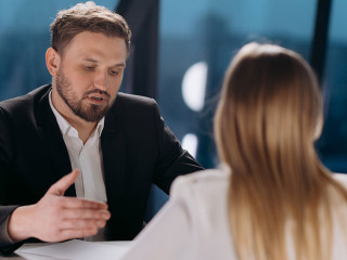 interview of a male and a female in the office. interview in the office. conversation of colleagues