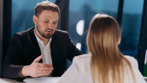 interview of a male and a female in the office. interview in the office. conversation of colleagues