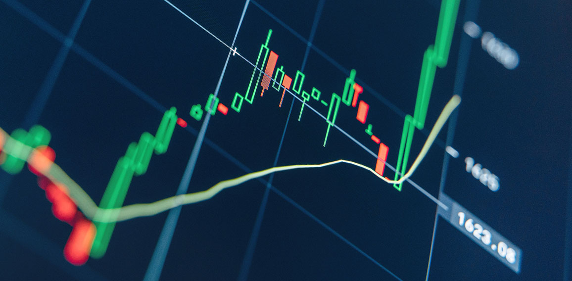 Crypto chart with green candlesticks going up indicating crypto rising in value on blue display
