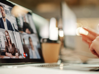 Multiethnic People Conference Meeting Online and Discussing Busi