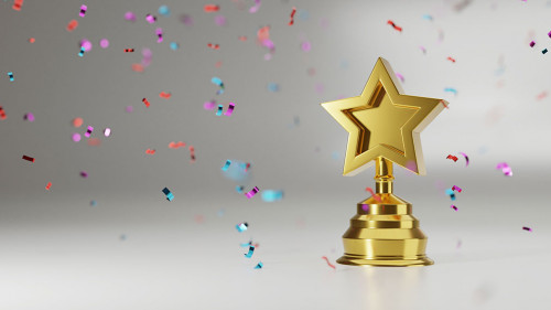 Golden star trophy cup on gold background. copy space for text.