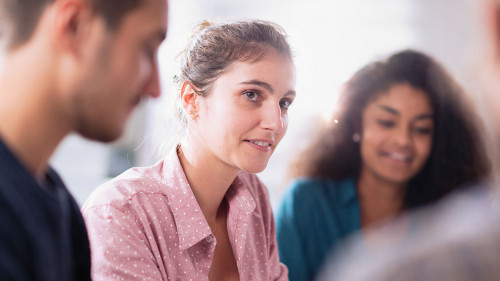 Meeting at college . A working multiethnic students group