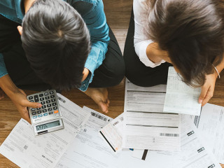 Top view asian couple sitting on the floor stressed and confused