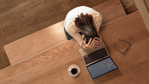 Tired emotional businesswoman at work. Late night stress problem