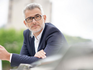 Businessman in town waiting for meeting