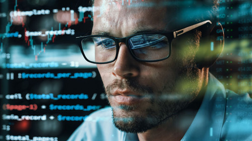 Close-up Portrait of Software Engineer Working on Computer, Line