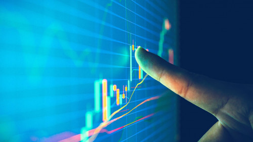 Closeup hand pointing finger on blue color monitor to analyze st