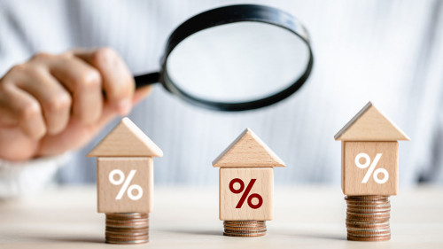 women customer using magnifying glass finding to interest rate h