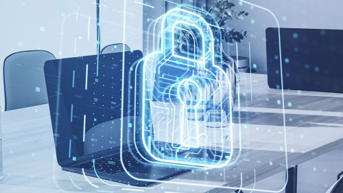 Close up of laptop with glowing padlock hologram on blurry background. Safety and security concept. Double exposure.