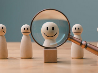 HRM or Human Resource Management, Magnifier glass focus to manager icon which is among staff icons for human development recruitment leadership and customer target group concept.