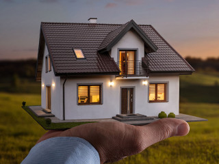 Concept of buying or building new home. Male hand showing, offer