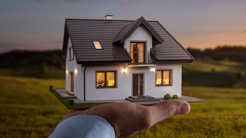 Concept of buying or building new home. Male hand showing, offer