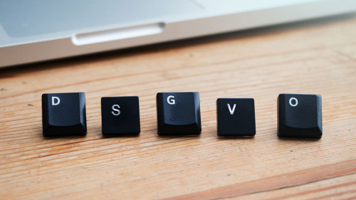 Dsgvo law with keyboard letters and laptop