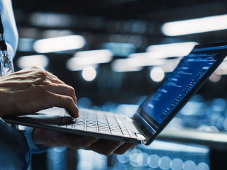 Data Center Programmer Using Digital Laptop Computer, Maintenanc