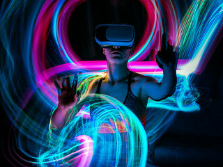 Metaverse digital Avatar, Metaverse Presence, digital technology, cyber world, virtual reality, futuristic lifestyle. Woman in VR glasses playing AR augmented reality NFT game with neon blur lines