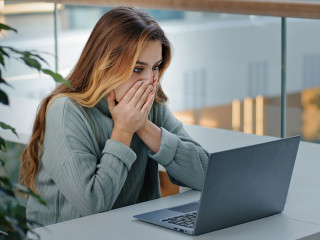 Caucasian stressful business woman with laptop frelancer girl frustrated shocked reading bad online news email failed test exam results reads unexpected terrible information upset problem notification