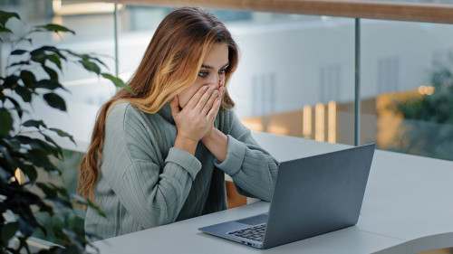 Caucasian stressful business woman with laptop frelancer girl frustrated shocked reading bad online news email failed test exam results reads unexpected terrible information upset problem notification