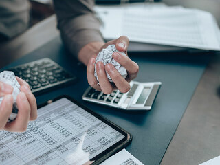 Serious Investors have a mad crump paper and angry while working