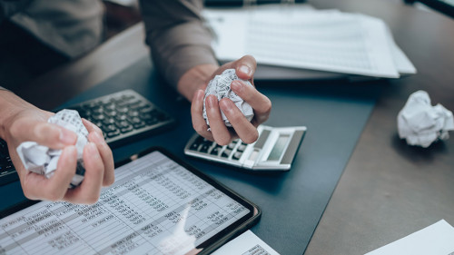 Serious Investors have a mad crump paper and angry while working