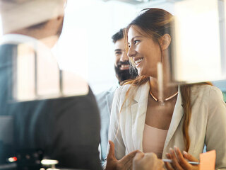 Collaboration and analysis by business people working in office
