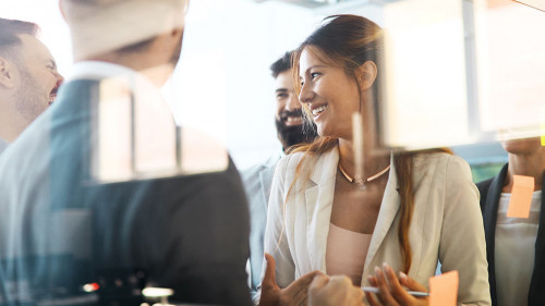 Collaboration and analysis by business people working in office