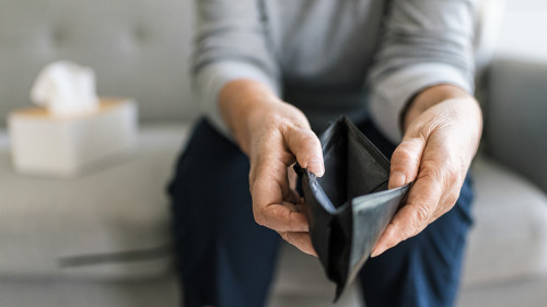 Elderly woman unhappy with the rising cost of living