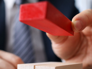 Presentable man in costume and watch