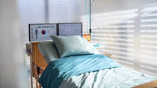 Empty bed in hospital room, coronavirus concept.