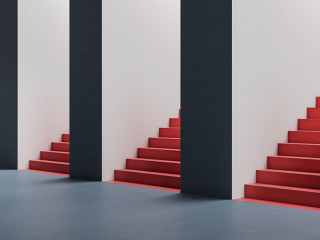 Attractive thoughtful young european woman standing in abstract concrete interior with question and confusion what entrance with staircase out of three to choose. Direction, success and choice concept.