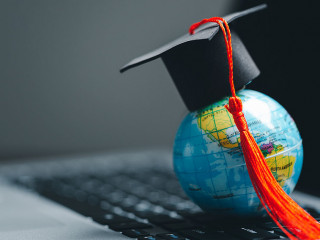 Graduation cap with Earth globe. Concept of global business study, abroad educational, Back to School. Education in Global world, Study abroad business in universities in worldwide. language study