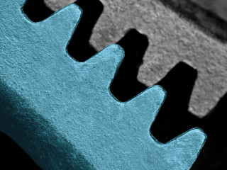 red steel cogwheel background