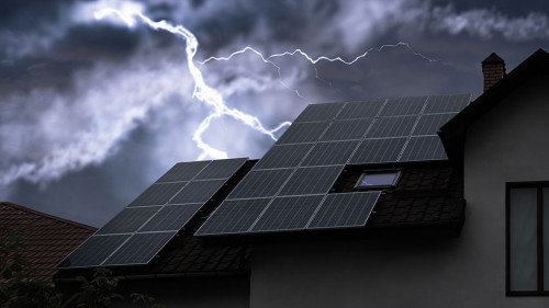 Dark cloudy sky with lightning over house. Stormy weather