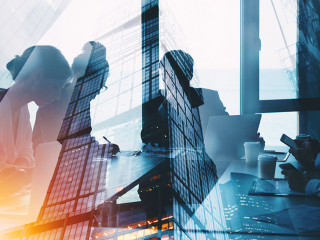 Silhouette of business people work together in office. Concept of teamwork and partnership. double exposure with light effects