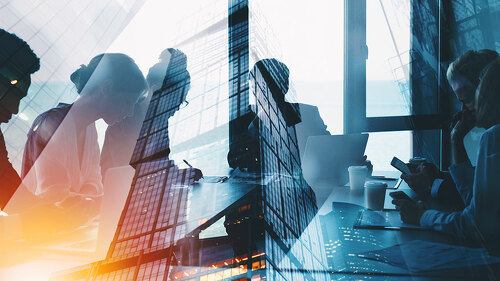 Silhouette of business people work together in office. Concept of teamwork and partnership. double exposure with light effects