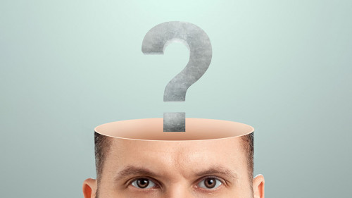 the male head is open instead of the brain with question marks. Creative background, concept of problem solving, searching for an answer, task, thinking.