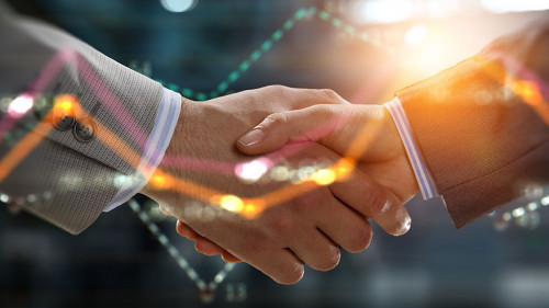 Partnership concept. Image of handshake