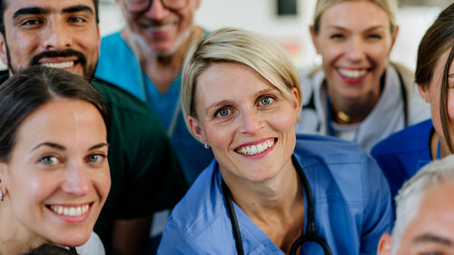 Portrait of happy doctors, nurses and other medical staff in hospital.