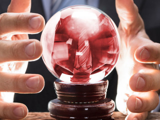Midsection Of Businessman Covering Crystal Ball
