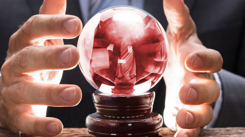 Midsection Of Businessman Covering Crystal Ball