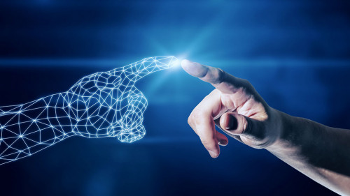 Businessman hand pointing at polygonal hand on dark blue background. Technology and digital transformation concept.