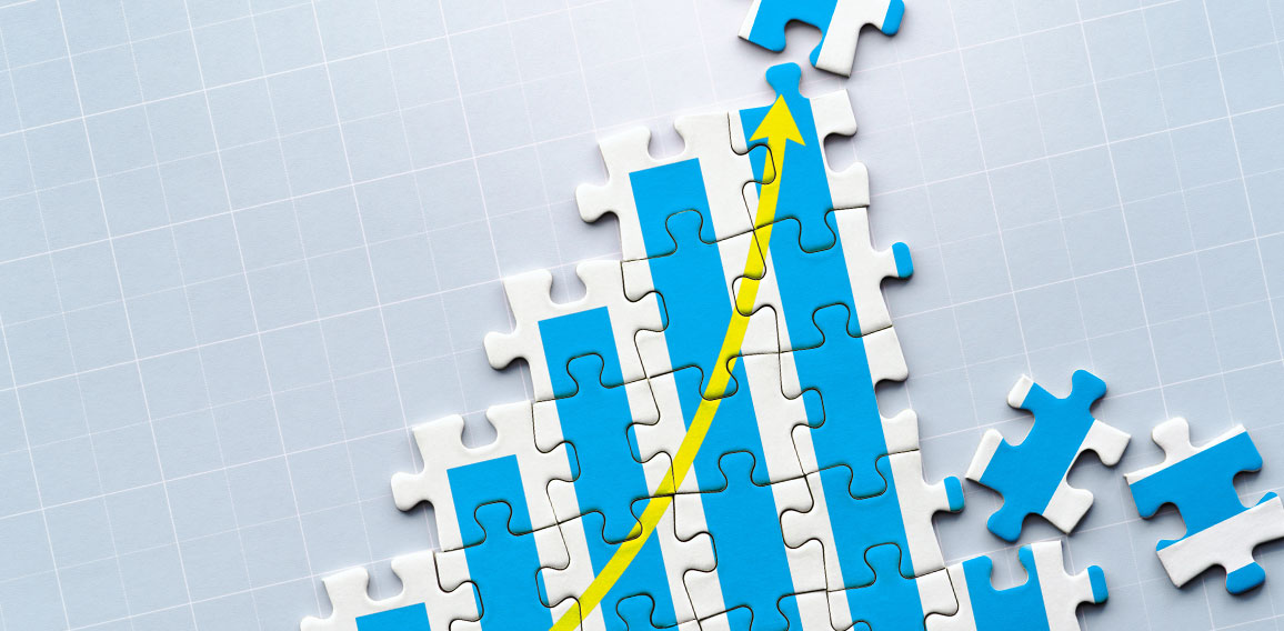 Creation of growth. Growth chart drawn on puzzle.