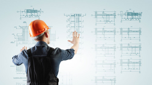 Construction industry concept with drafts and plans . Mixed media