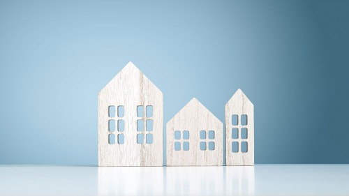 House real estate and construction background, wooden model hous