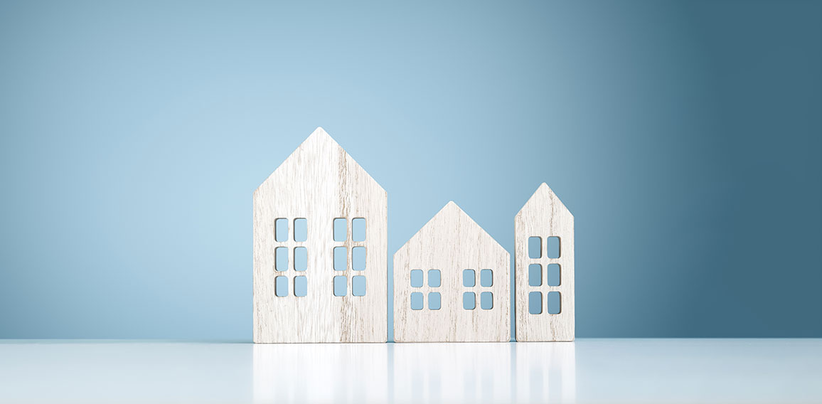 House real estate and construction background, wooden model hous