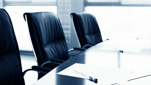 White paper with pen in the meeting room